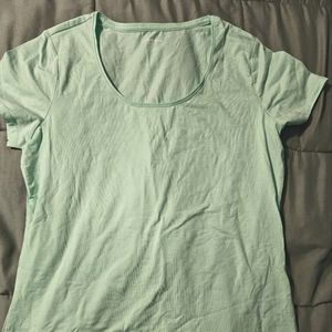 Mint colored loose long fit short sleeve shirt